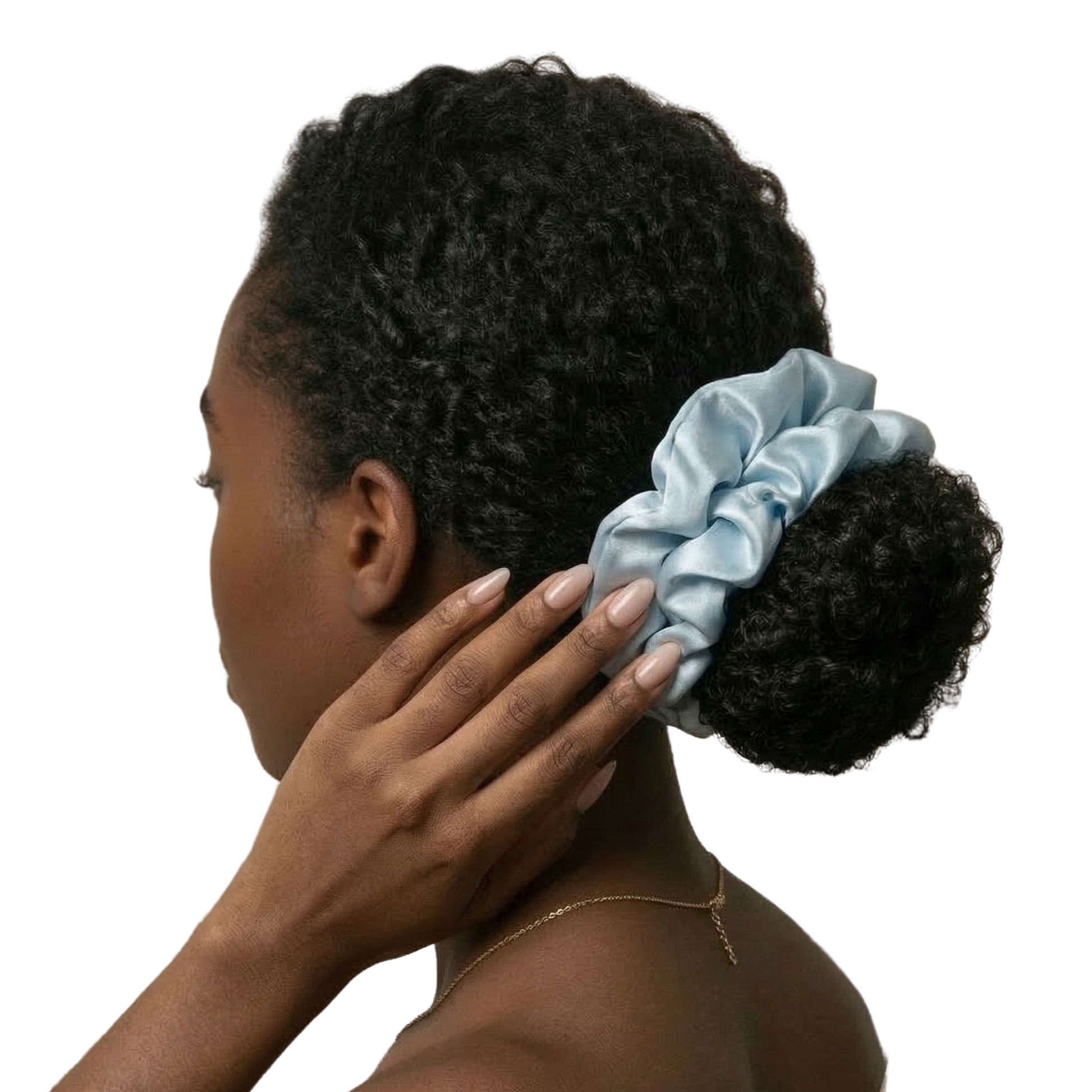 Woman with a blue scrunchie in her hair on a white background