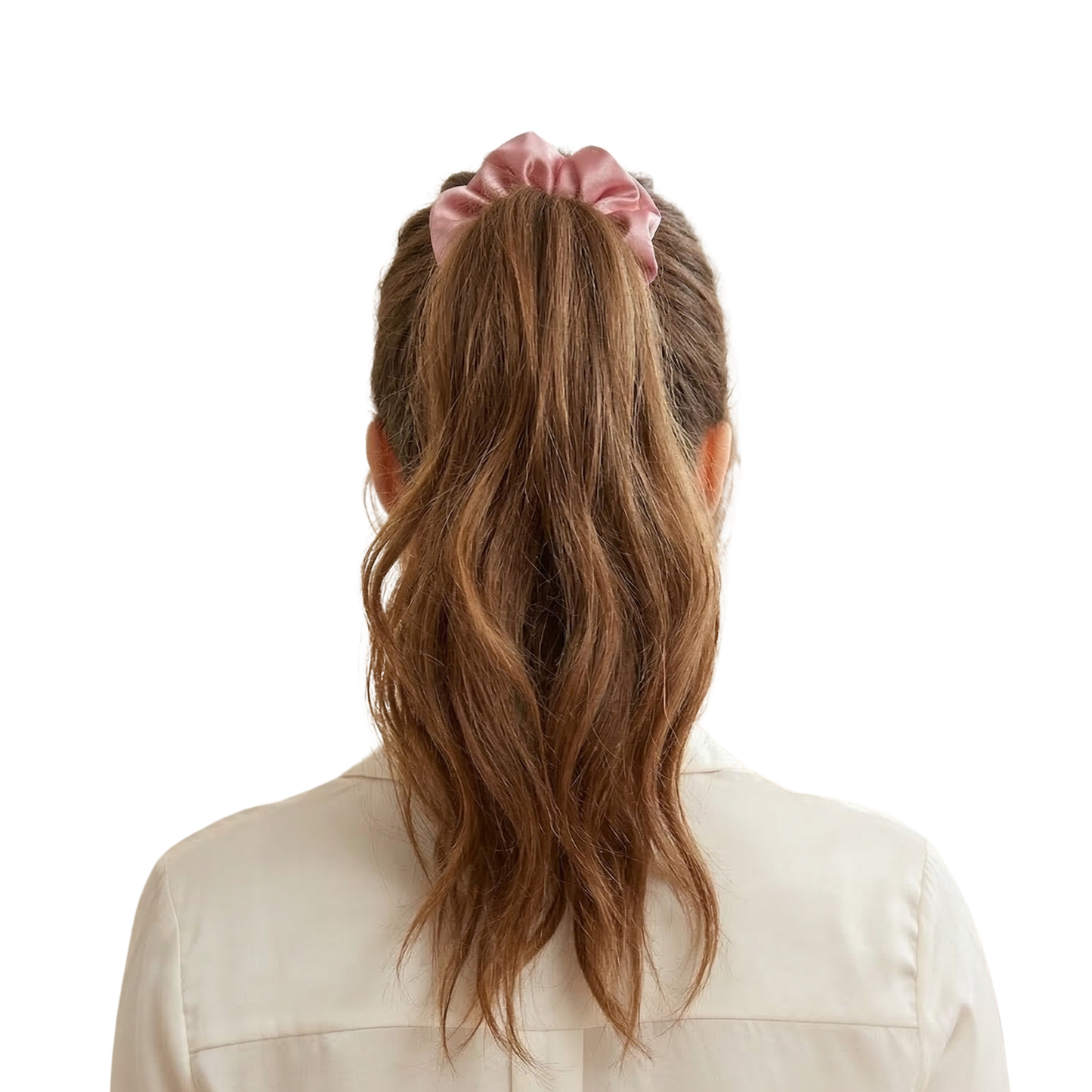 Back view of a person with wavy hair tied with a pink scrunchie on a white background