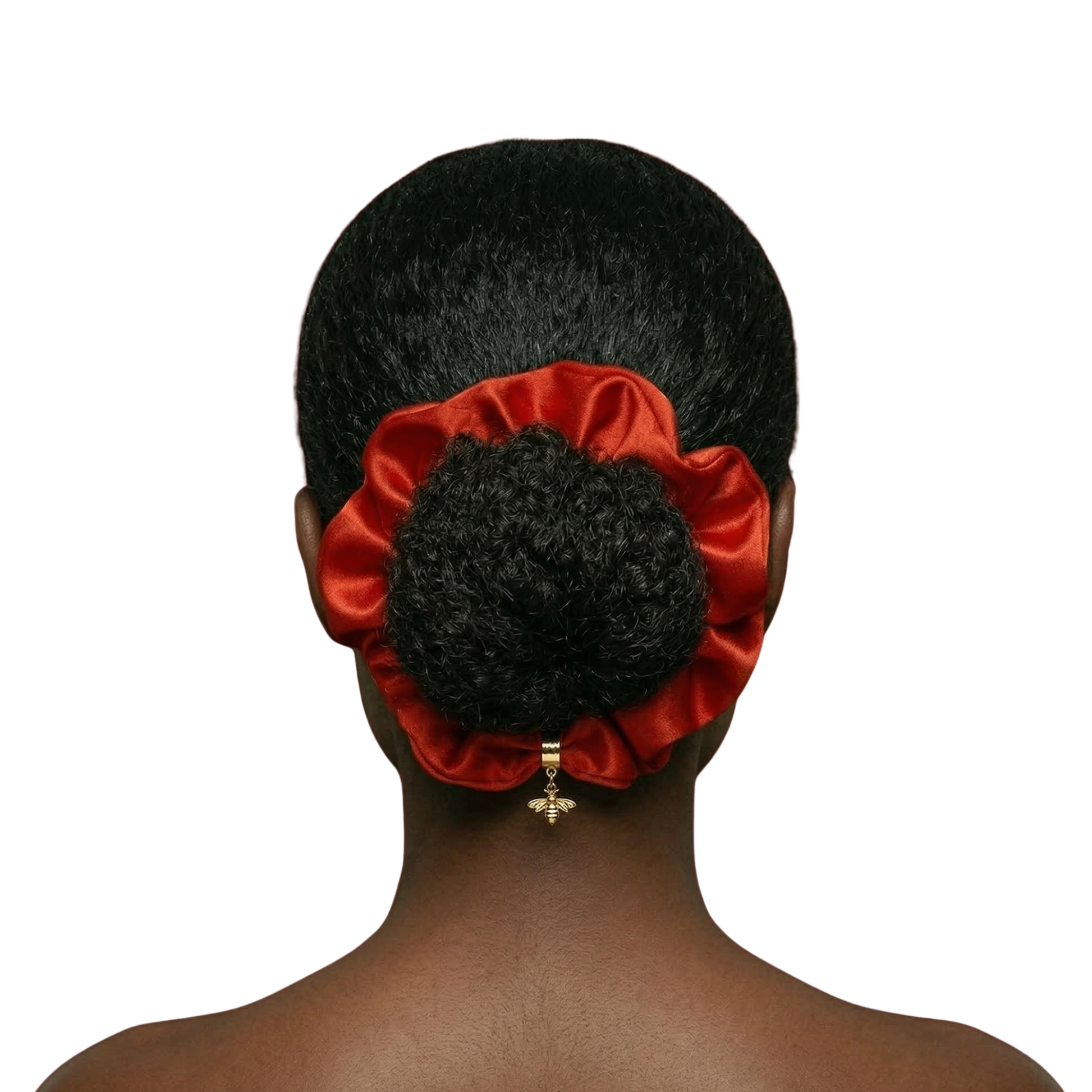 Red satin hair scrunchie on a person's hair against a white background