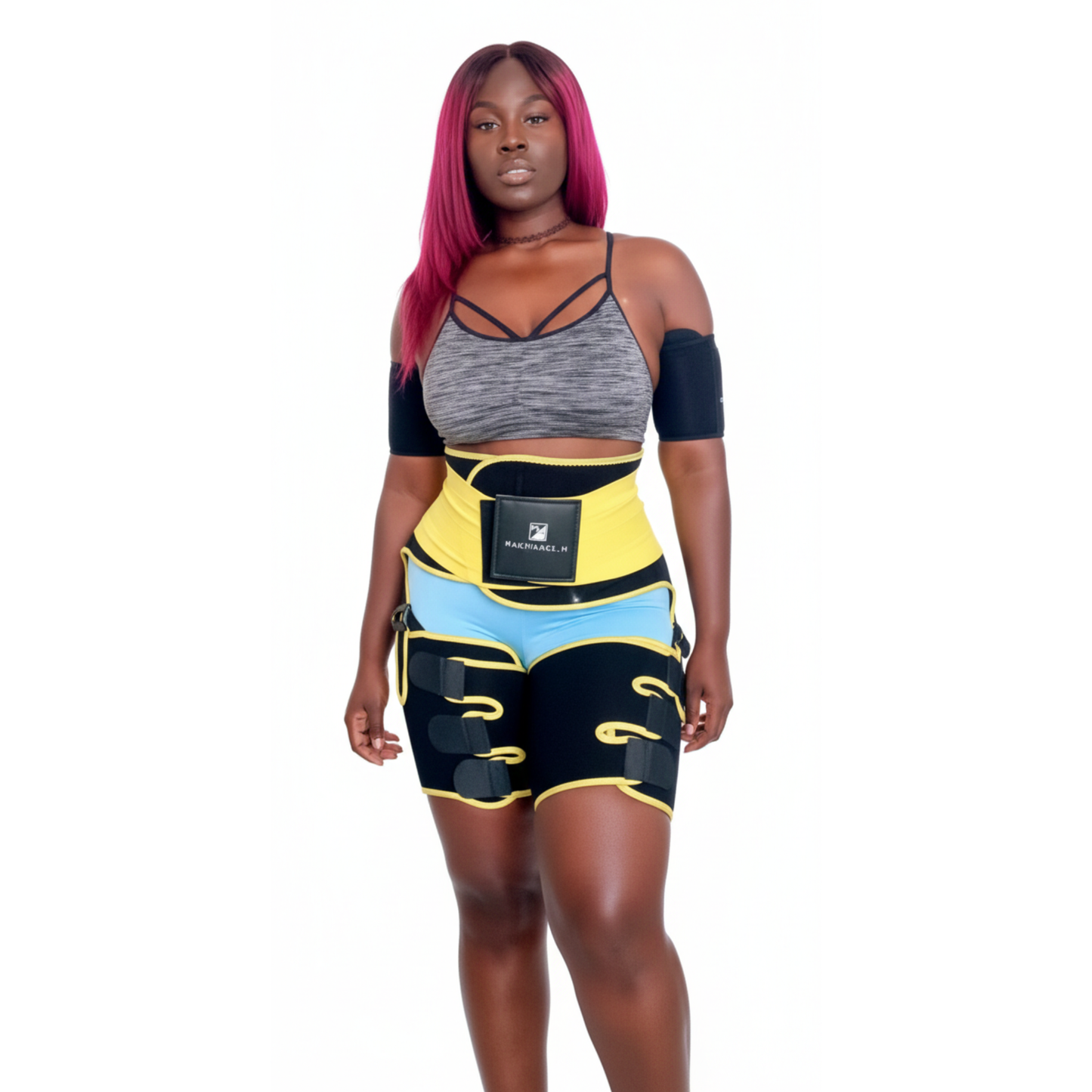 Woman wearing a waist trainer with colorful design on a white background