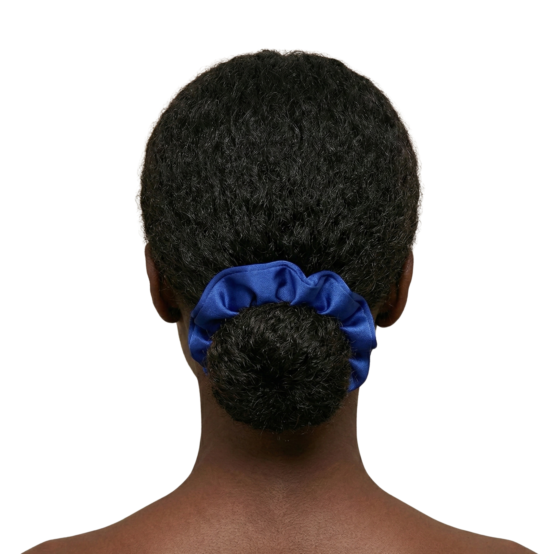 Blue scrunchie on a bun against a white background