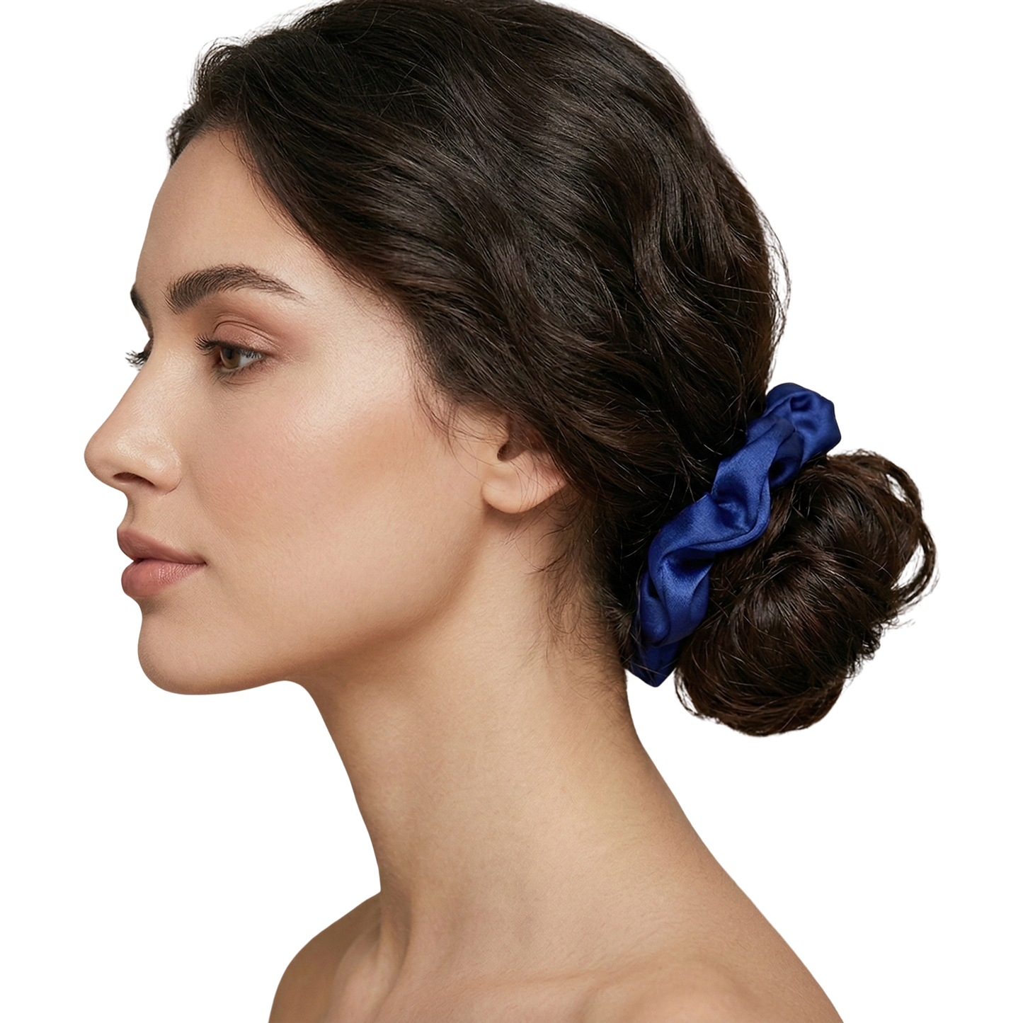 Woman with a side bun featuring a blue hair accessory on a white background