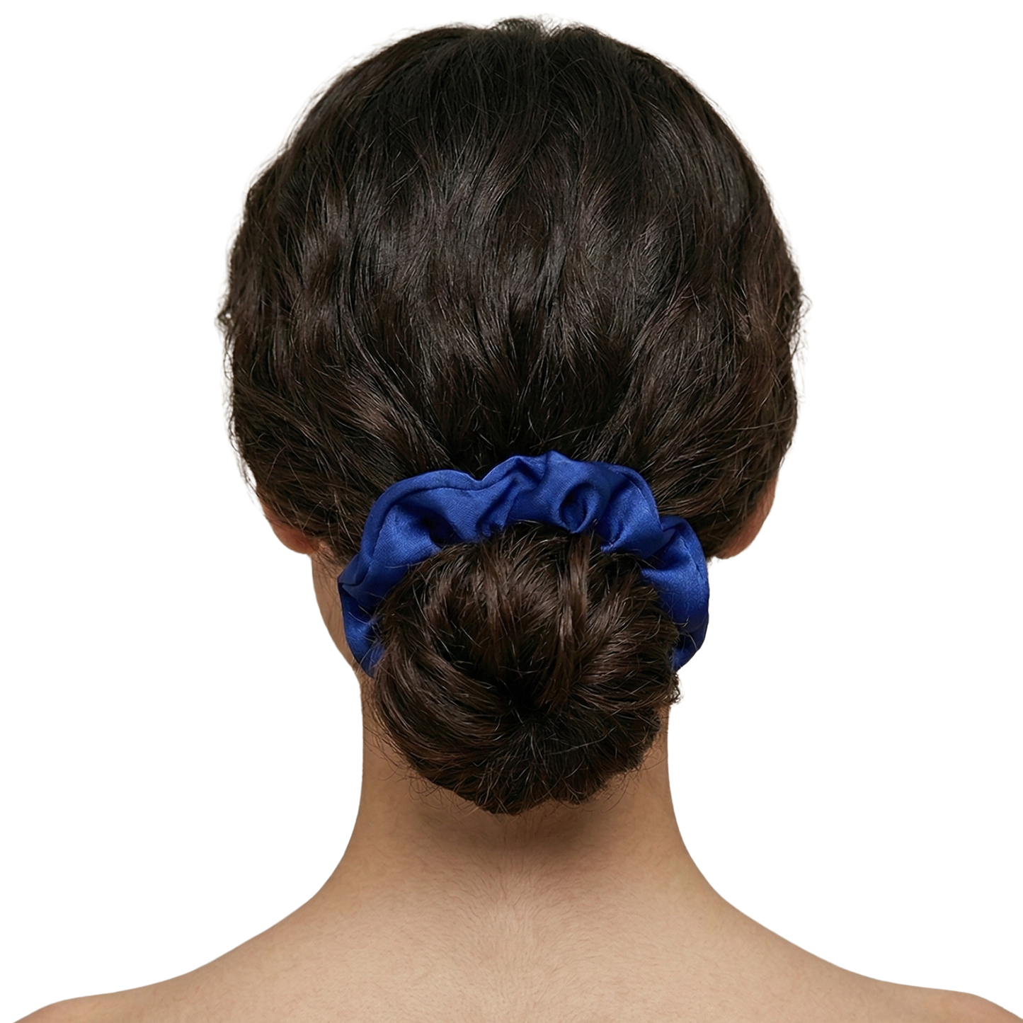 Blue scrunchie on a bun against a white background