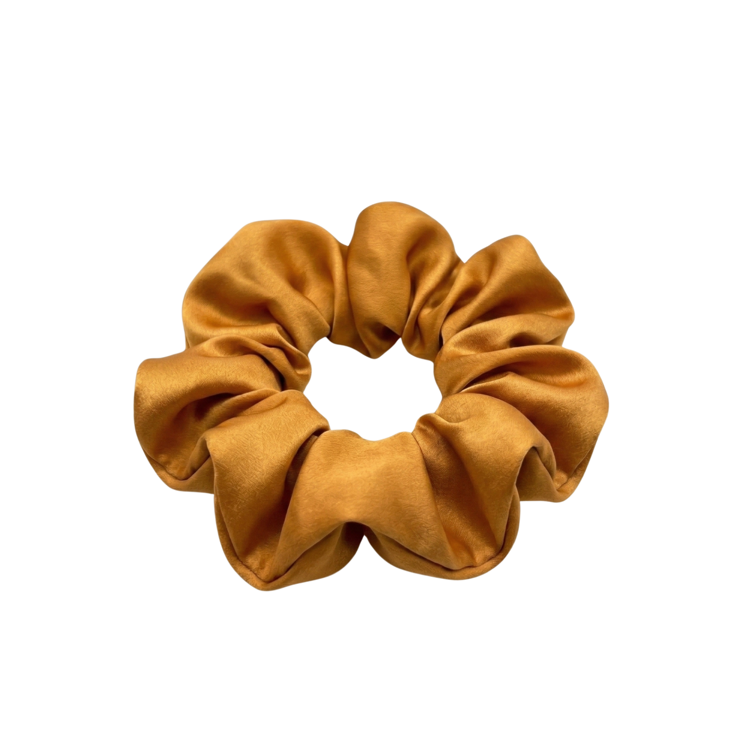 Mustard yellow scrunchie on a white background